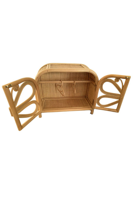 A rattan made dolls clothes dresser shaped as a butterfly. It has it doors open and has two small rattan made coat hangers for dolls clothes or girls hair accessories