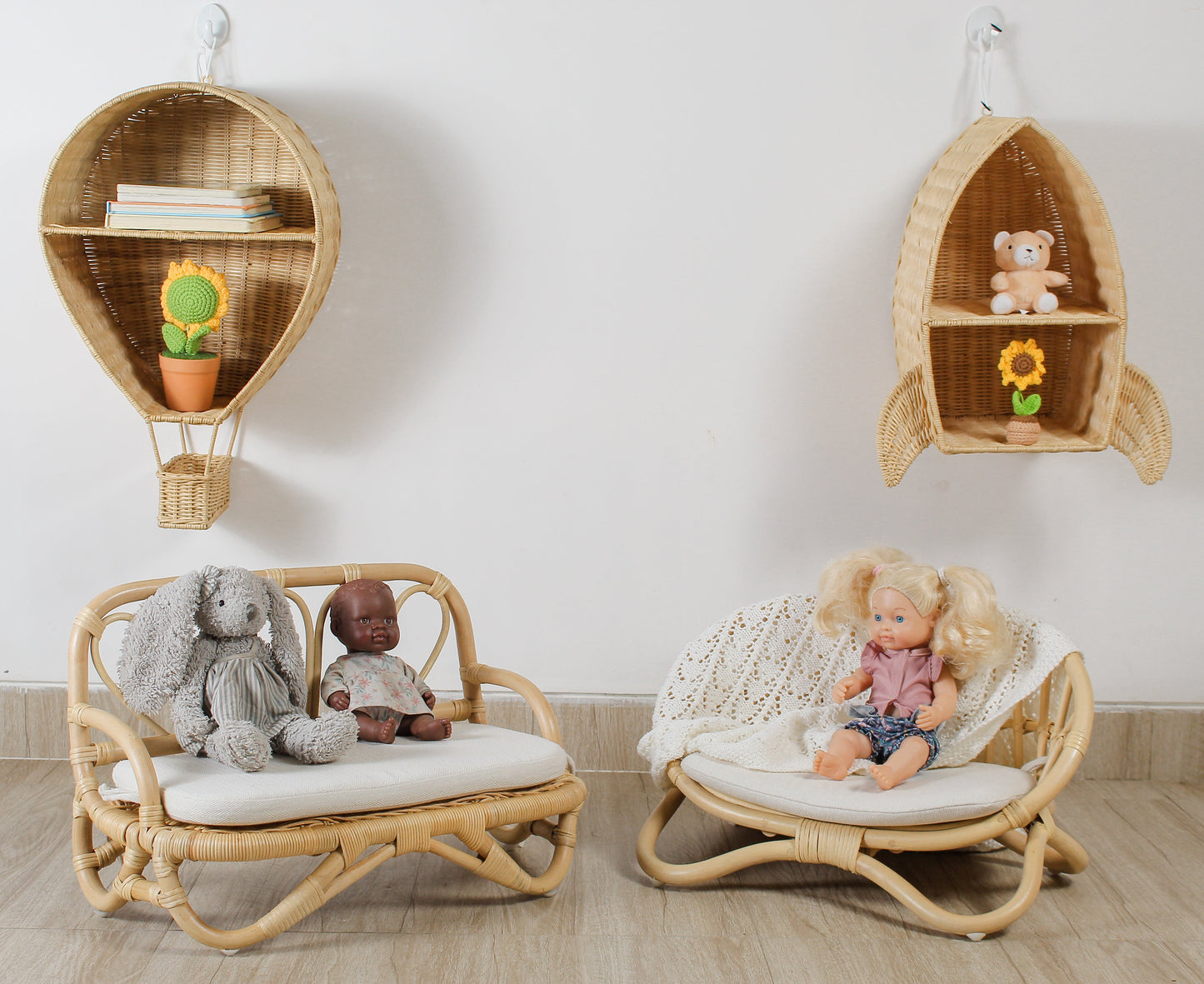 The image captures the miniature couch as a curated display. This level of detail and craftsmanship makes it a premier item in a curated baby gift box or a standalone newborn gift for a stylish family.