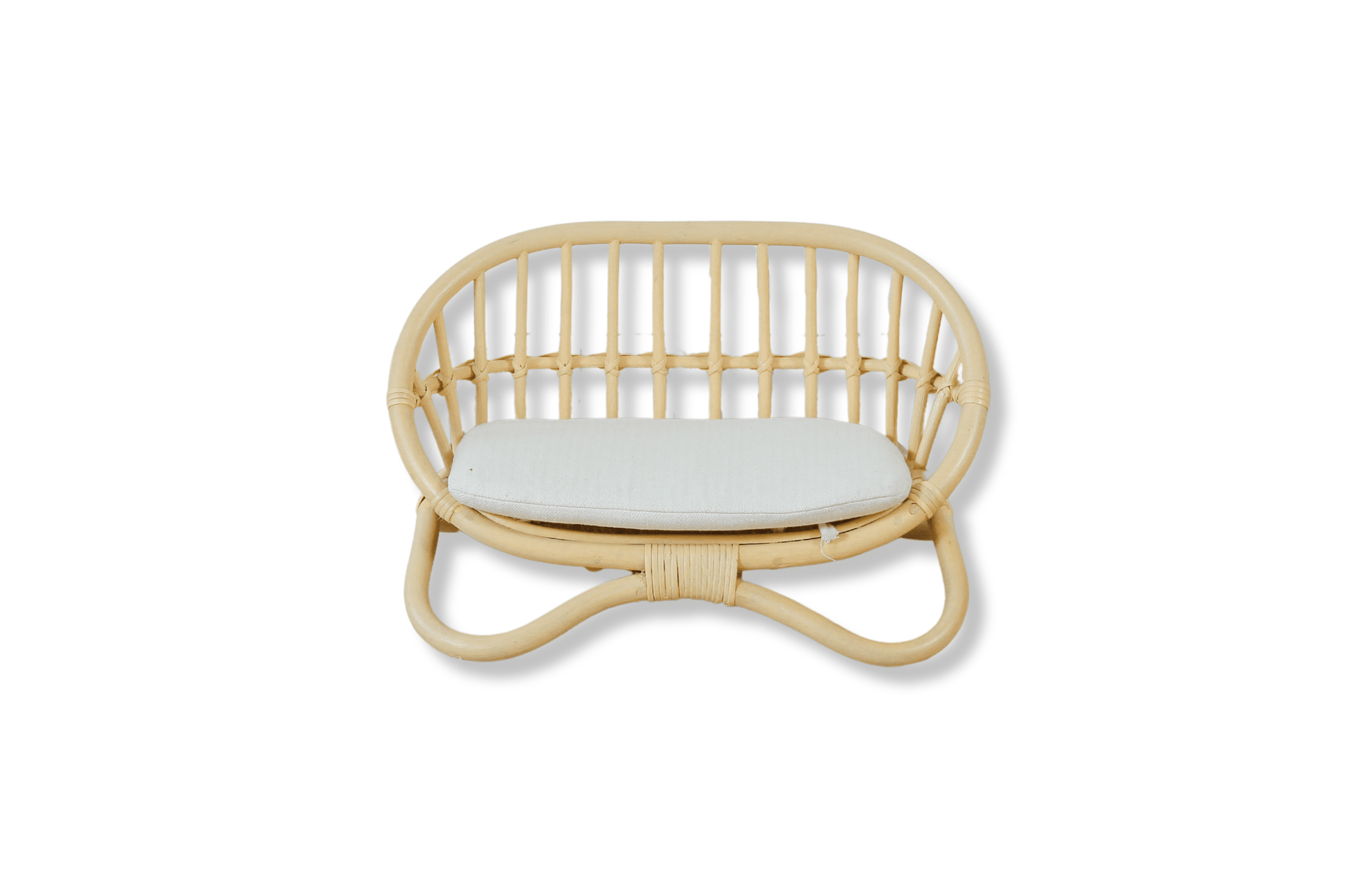 A clear, direct photo of the miniature rattan couch. While visually beautiful, the textures and tiny scale provide rich, structured visual input, aligning well with the aesthetic and quality principles of educational toys and sensory toys for display.