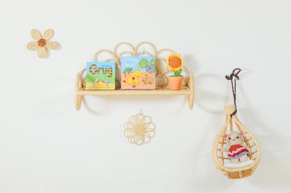 Decorative shelf with small figurines and a hanging basket on a white background. Kids Christmas present. 