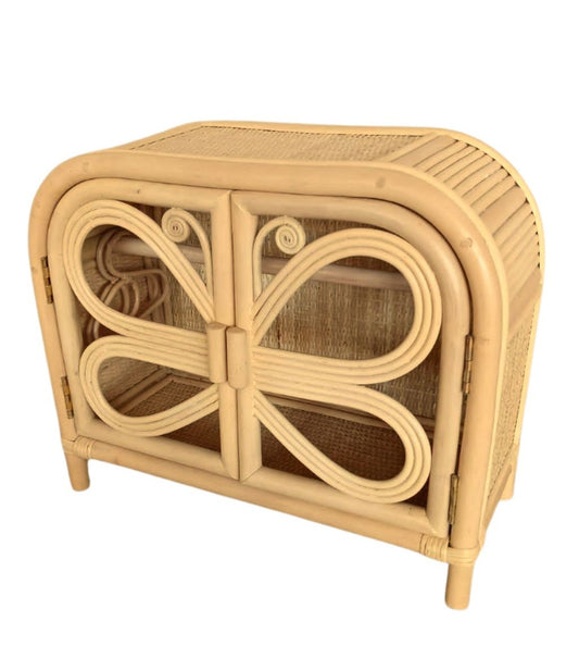 A rattan made dolls clothes dresser shaped as a butterfly. Good for little girl's who like to play doll dress ups and for parents who like Montessori toys. Comes with two rattan made coat hangers.