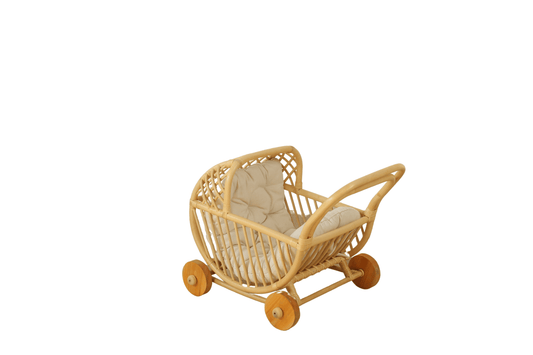 A beige rattan doll stroller with four wheels and a plush toy seat inside.