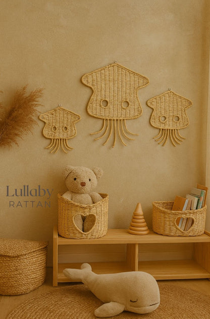 Handmade rattan jellyfish wall decor on aqua kids room wall; boho coastal nursery wall art; eco-friendly wicker hanging for playroom or beach house.