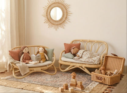 Children's room with wicker furniture, plush toys, and a basket filled with items.