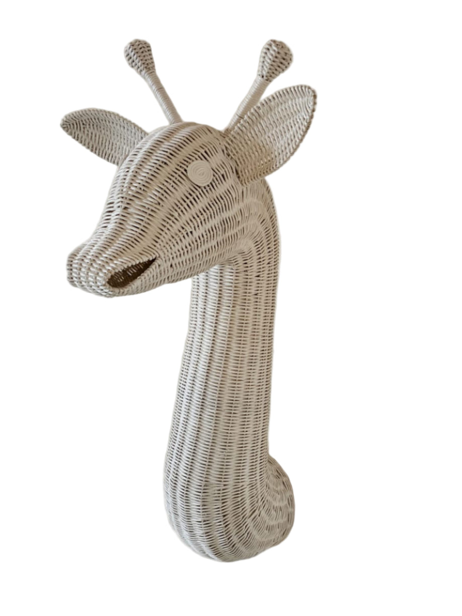Woven giraffe head decoration on a white background