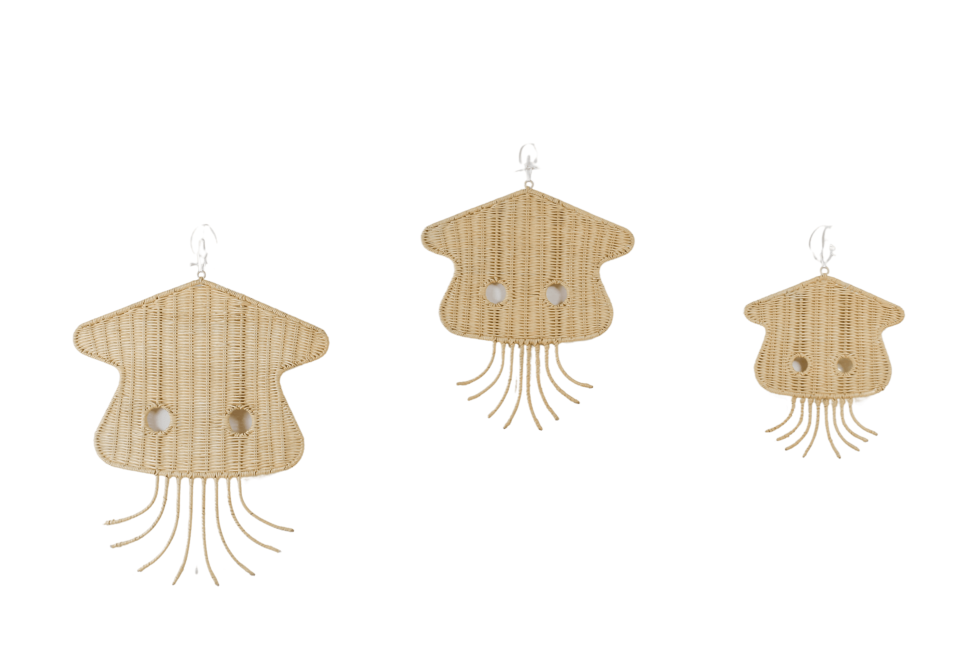 Rattan made jellyfish hanging on a white wall. Kids room design. 