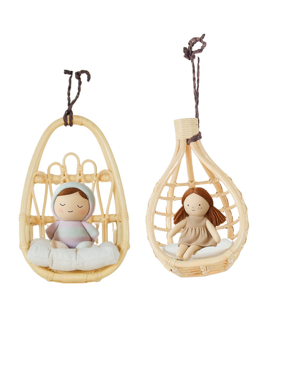 Rattan doll hanger chair displayed on a little girl’s bedroom wall, surrounded by soft pastel boho decor.