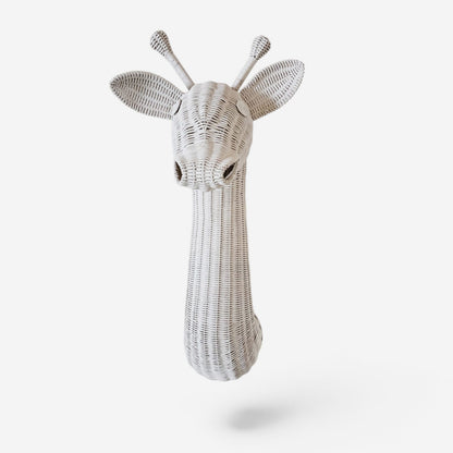 Decorative wicker giraffe head on a white background