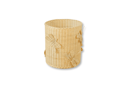 A dragonfly or butterfly inspired laundry hamper or toy storage basket to keep clothes, toys, blankets or tiny treasures. Made of 100% rattan, beige in color. 