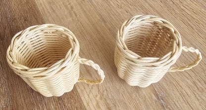 Close-up detail of handwoven rattan tea set craftsmanship