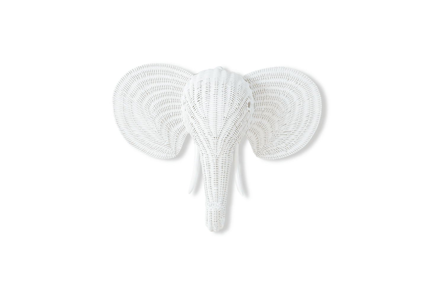 Handcrafted rattan wall decoration in the shape of an elephant head with a natural finish.